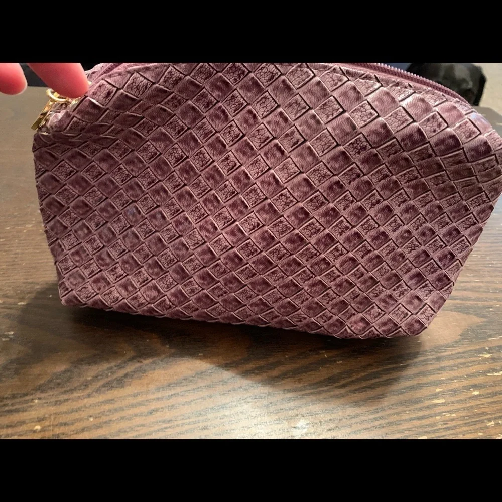 Estee Luader purple makeup bag